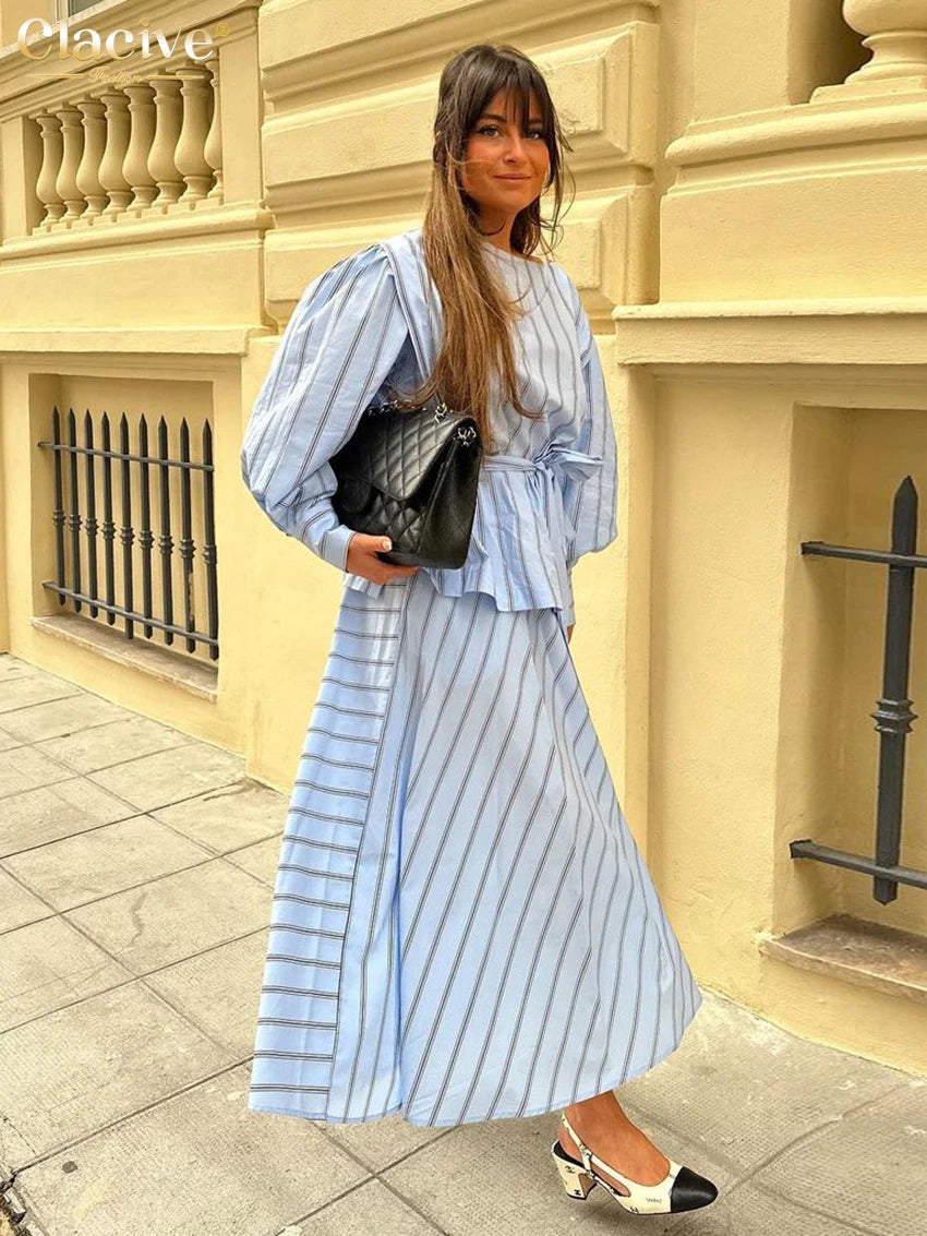 طقم ملابس نسائي من قطعتين من Clacive Fashion مطبوع عليه خطوط فضفاضة، يتكون من قميص أنيق بأكمام طويلة مع تنورة عالية الخصر بطول الكاحل